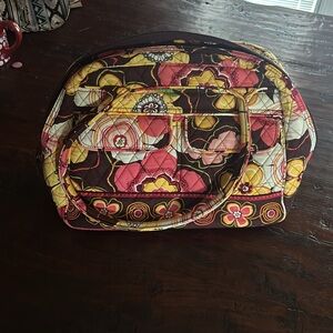 VERA BRADLEY BAG. ZIP side pockets and double side pockets on other.